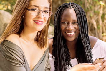 Group of happy kids hugging each other